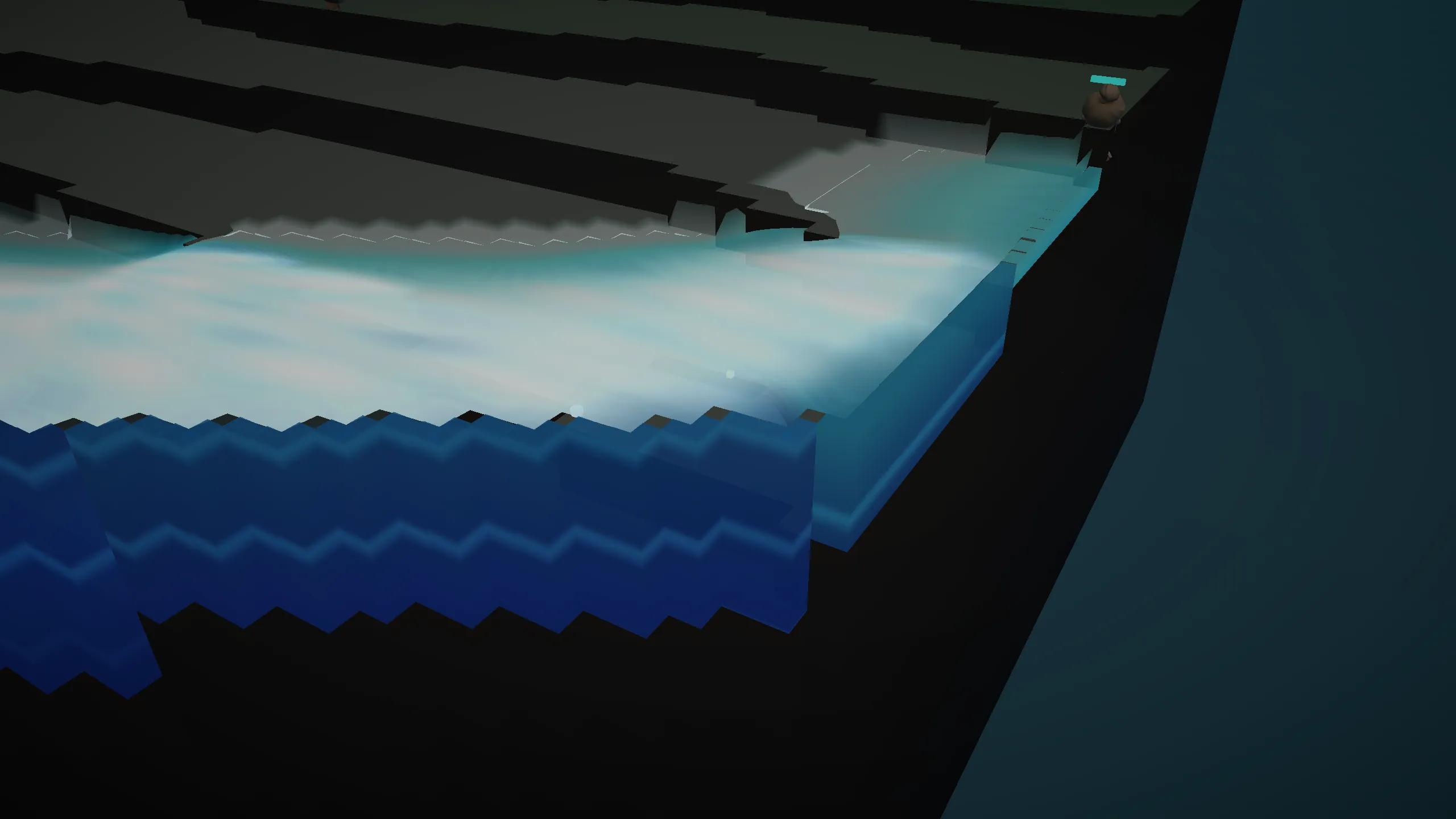 Water breaking through a gap in dark terraced ground